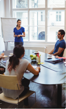 business-executives-applauding-their-colleague-after-presentatio