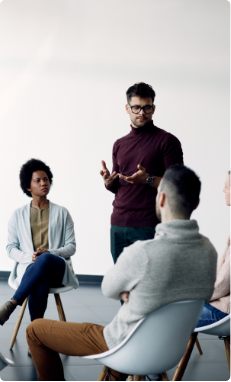 young-man-talking-about-his-problems-group-psychotherapy